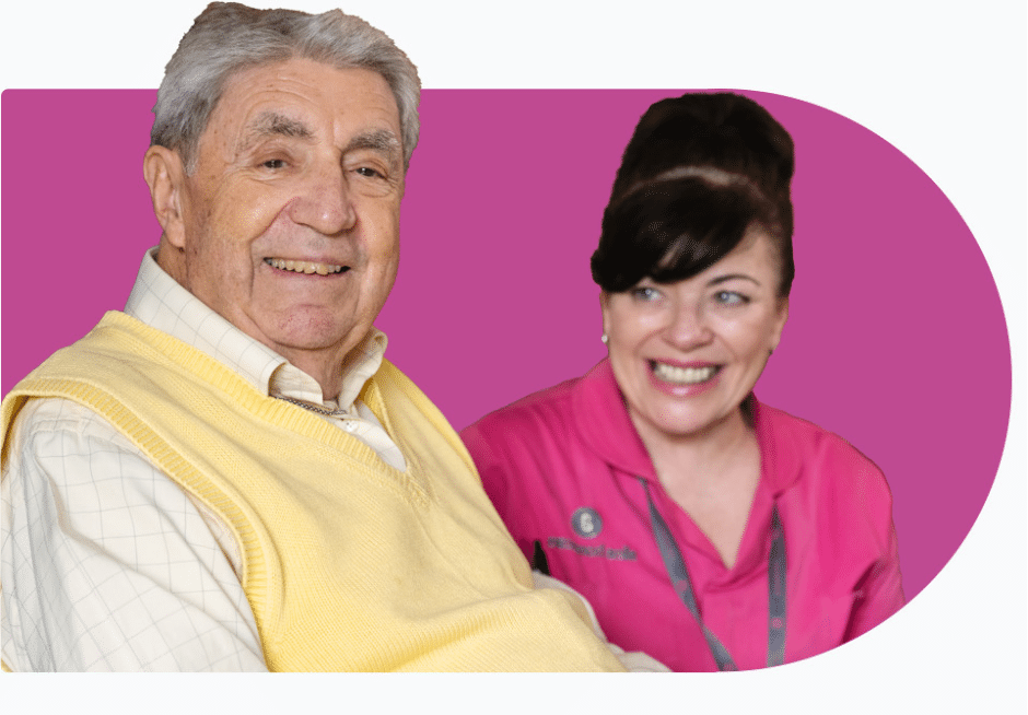 Female Carer with male client who receives Respite Care smiling