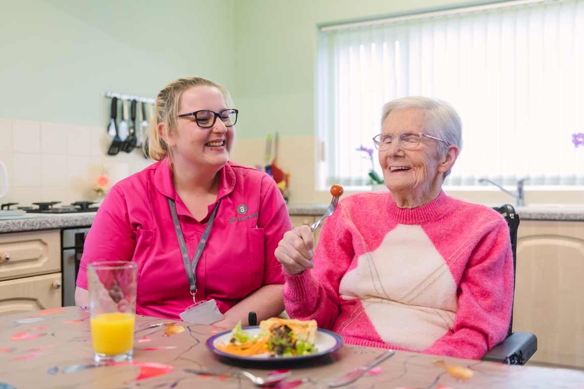 Carer with client who receives Home Help