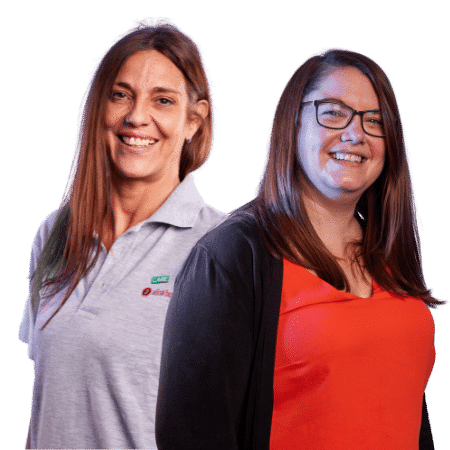 Staff smiling with care worker jobs