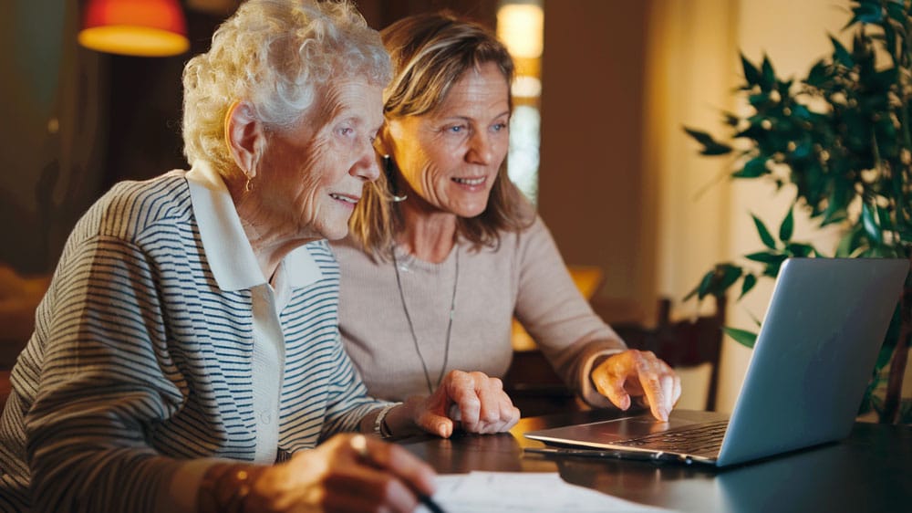An elderly woman and her daughter apply for benefits while trying to avoid common attendance allowance pitfalls